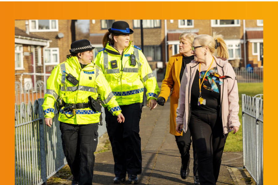 two police officers and two Gentoo colleagues talking